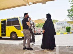 GR-12-Boys giving donation at Sharjah City for HumanitarianServices